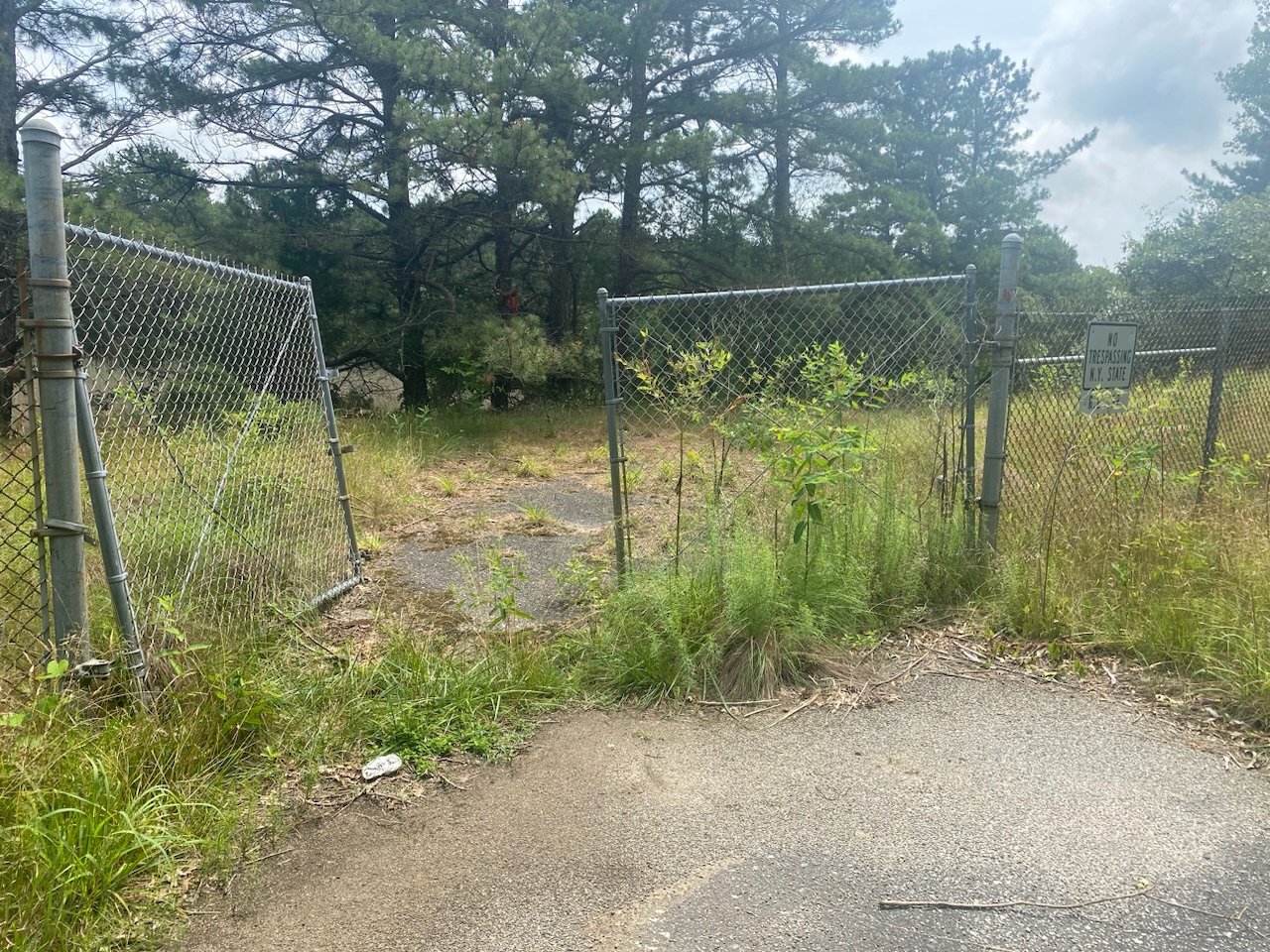 The end of the debris-strewn sump access road in Manorville where Taylor was found dead