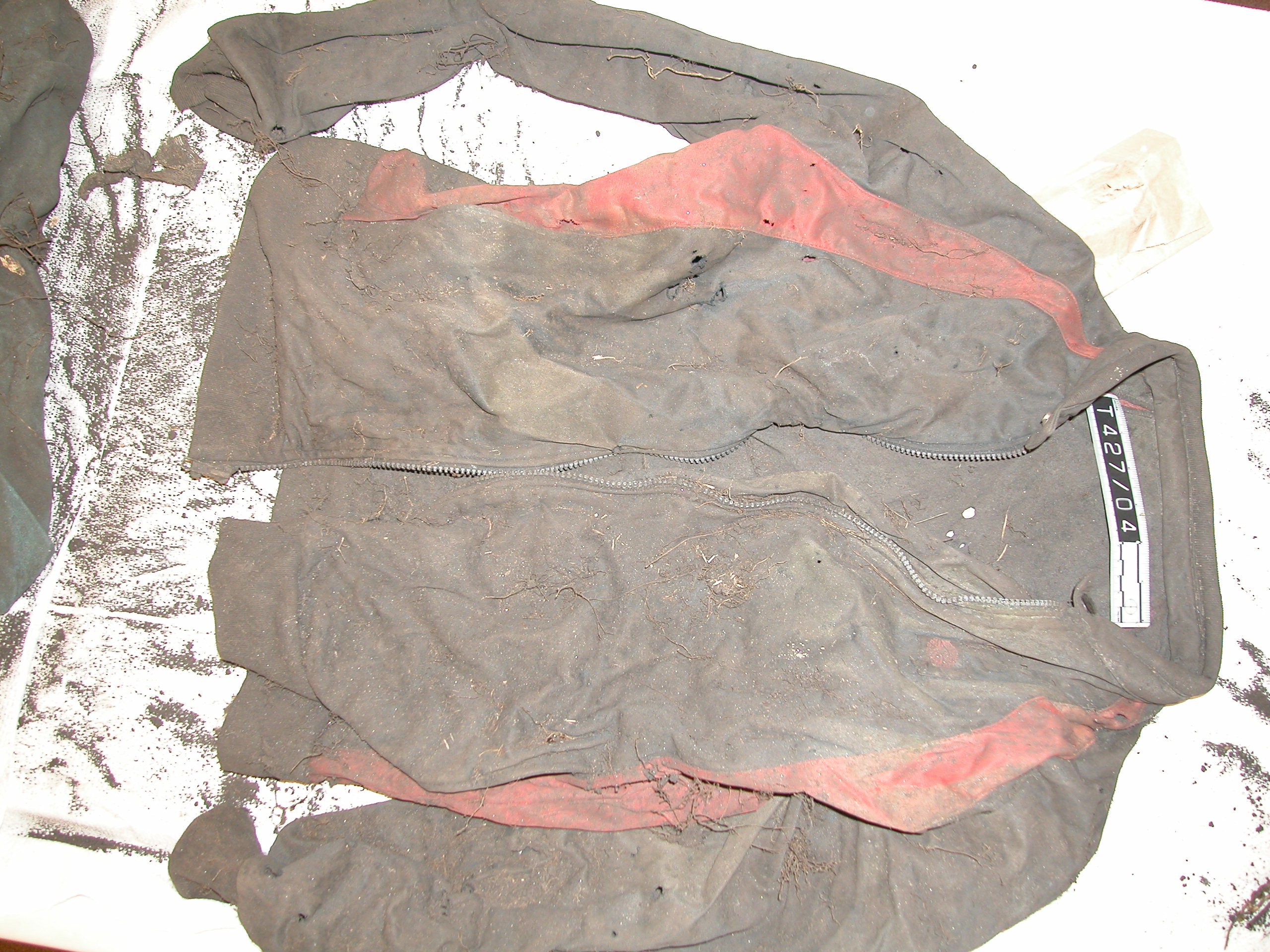BLACK JACKET WITH RED STRIPES FOUND WITH BODY
