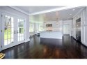 Long shot of kitchen with view to garage interior door.jpg