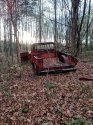 Back_headlight_of_red_truck_off_Shaw_road.jpg