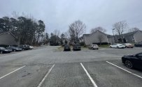 Parking lot view facing Entrance and Building 252 to the left.jpg
