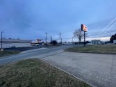 View of Webster Rd stop sign at Randleman Rd from direction of Auto Zone camera.jpg