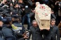 The-coffin-of-Tignous-is-carried-outside-the-town-hall-of-Montreuil.jpg