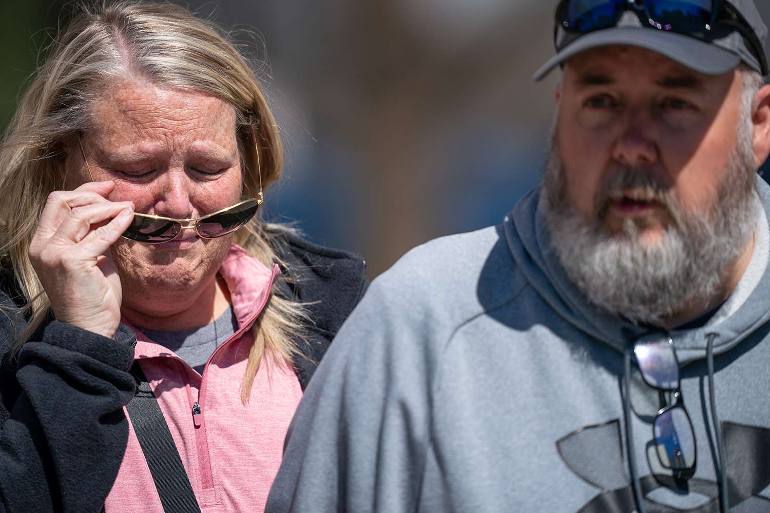 Michelle Strain Whiteid, left, and her husband, Chris Whiteid, speak to the media during a press conference to update the public about the disappearance of University of Missouri student Riley Strain at Public Square Park in Nashville