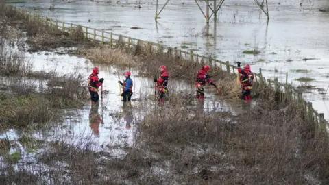 PA Media Search crews look for the boy in waters near the river