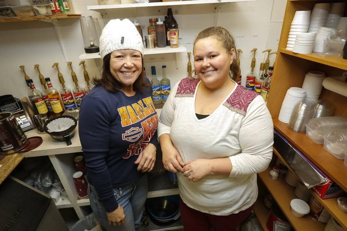 Chiloe Chervenell, right, owner of Chiloe’s Corner 12 Step Cafe, poses for a photo with volunteer Toni Rae Hamilton Atchley. Chervenell opened her cafe in the Tri-City Alano Club in 2017.
