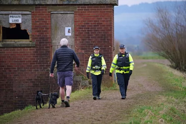 0_Police-officers-walk-along-a-footpath-in-St-Michaels-on-Wyre-Lancashire-as-they-continue-their-search-for-missing-woman.jpg