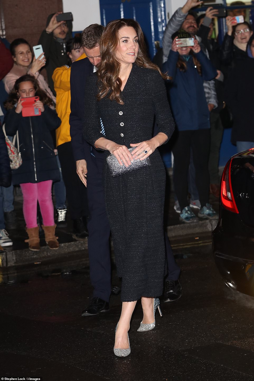 25187798-8043087-Kate_Middleton_cut_a_fashionable_figure_as_she_arrived_at_the_No-a-37_1582660671234.jpg