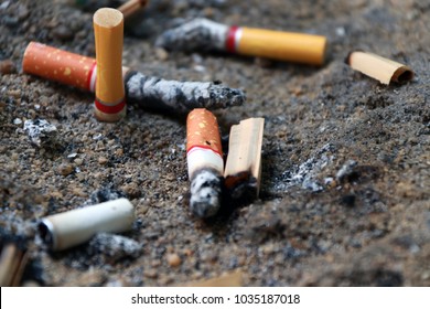 cigarette-butts-pile-sand-burned-260nw-1035187018.jpg