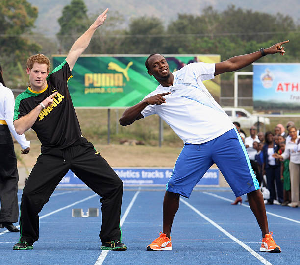 prince-harry-poses-with-usain-bolt-at-the-usain-bolt-track-at-the-of-picture-id140763662