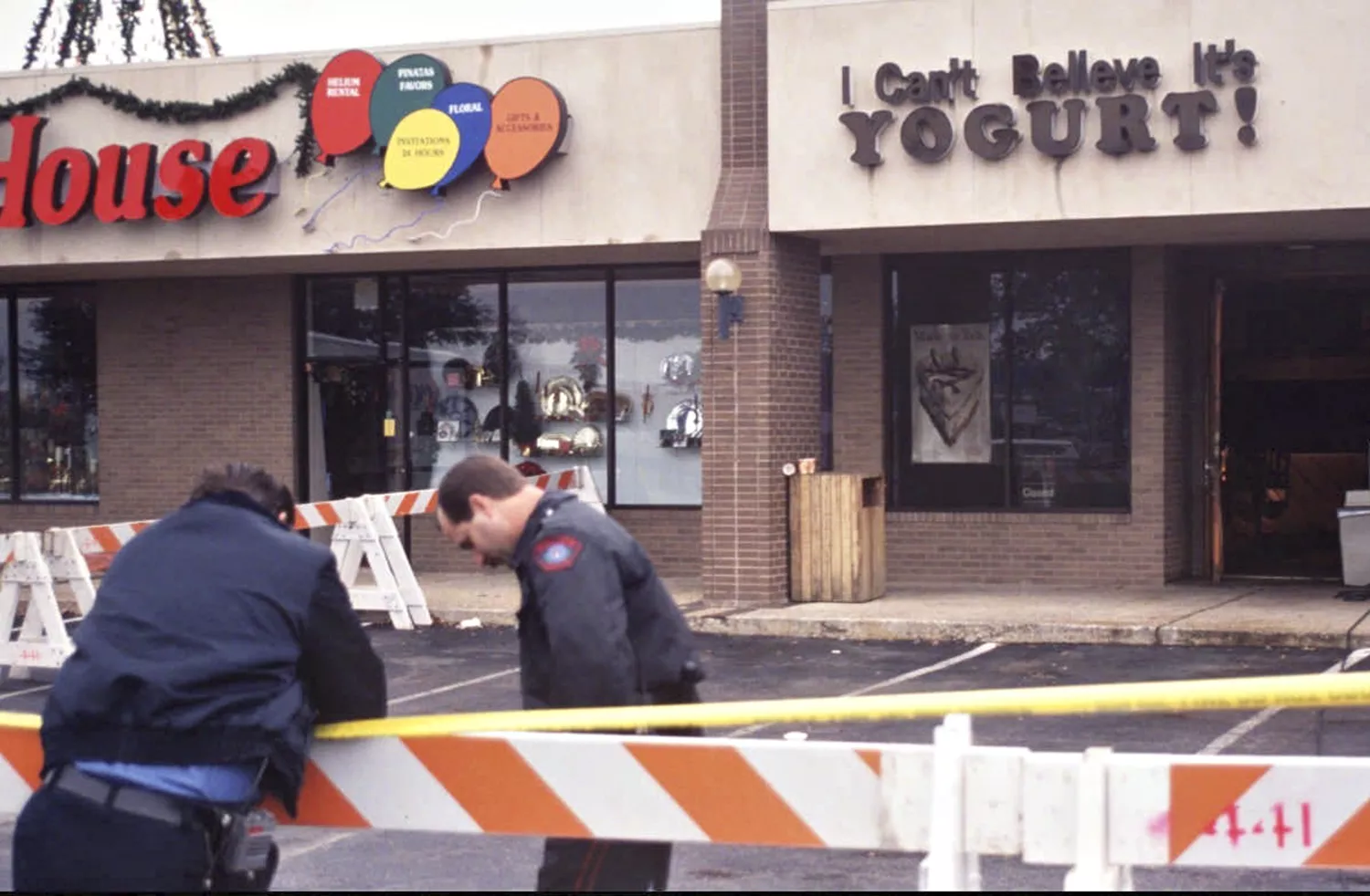 Officers at the scene of the Yogurt Shop murders.