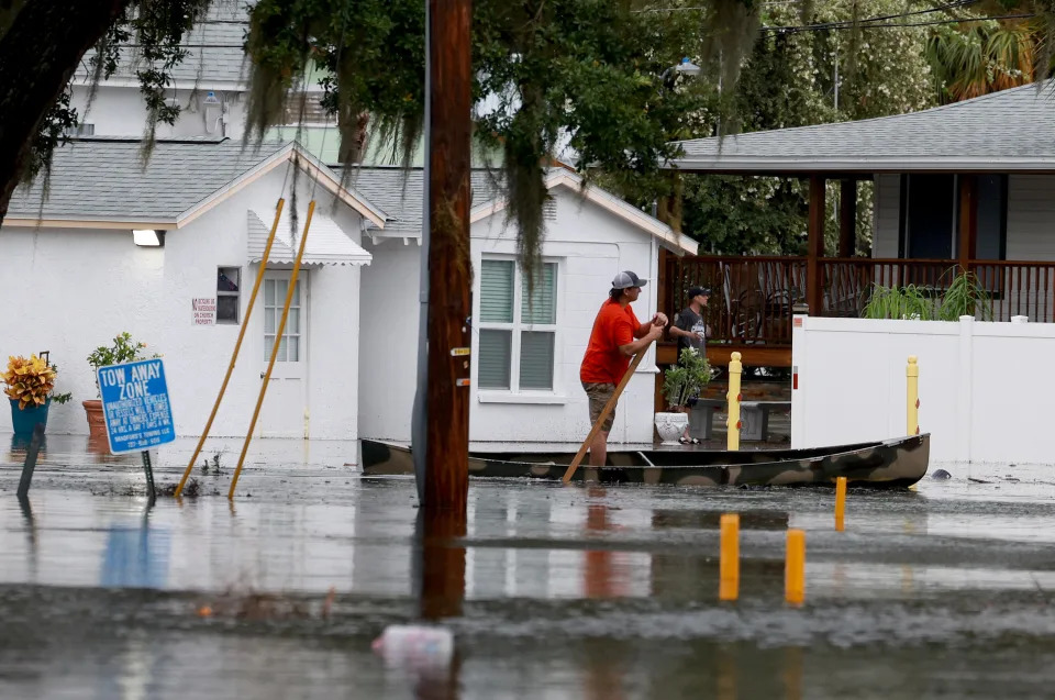 A person canoes through the flooded streets caused by Hurricane Idalia on August 30, 2023, in Tarpon Springs, Florida.  / Credit: Getty Images