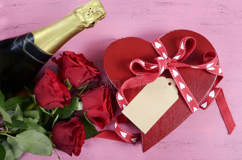 valentines-day-red-heart-shape-gift-box-bottle-champagne-red-roses-happy-shabby-chic-vintage-style-pink-wood-table-49317466.jpg