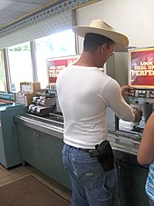 170px-Open_Carry_of_a_9mm_Browning_Hi_Power_in_Eagle%2C_Colorado.jpg