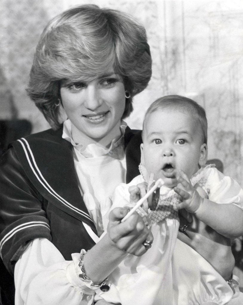 prince-william-1982-these-pictures-are-a-christmas-present-to-the-whole-nation-they-give-us-our-first-look-at-prince-william-now-six-months-old-since-he-was-sleepily-sucking-his-mother-s-finger-at-h-814x1024.jpg