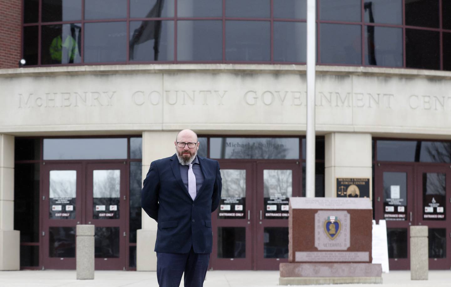 Attorney Michael Mick Combs outside the McHenry County Government Center on Wednesday, Dec. 21, 2022. Twenty years ago, 17-year-old Brian Carrick disappeared and was presumed murdered. He was last seen in the Val's Finer Foods in Johnsburg on Dec. 20, 2002. Combs was the prosecutor who tried Mario Casciaro, who was arrested and charged with murder by intimidation, but his conviction overturned on appeal.