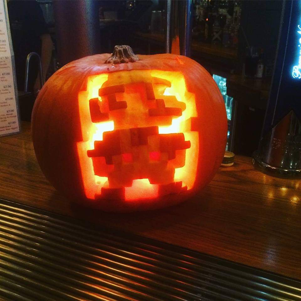 Give this person who made an 8-bit Mario jack-o'-lantern infinite coins ...